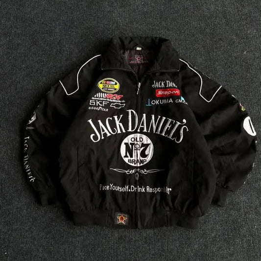 Black jacket with multiple brand logos on a gray background