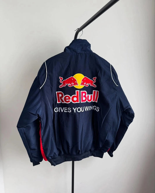 Navy blue jacket with Red Bull logo and text on a white background