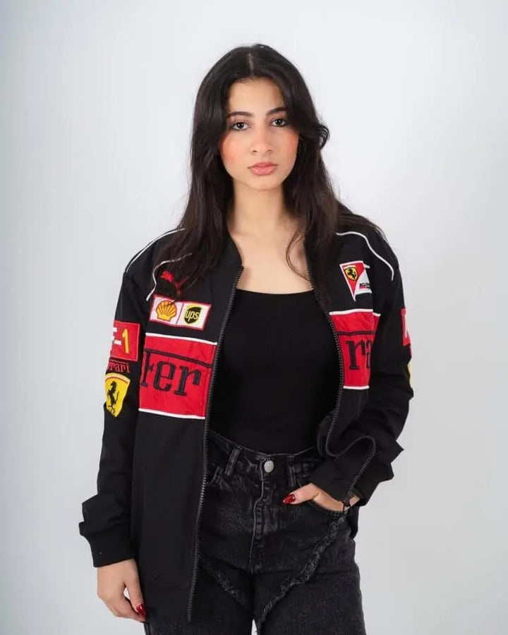 Woman in black Ferrari racer jacket.