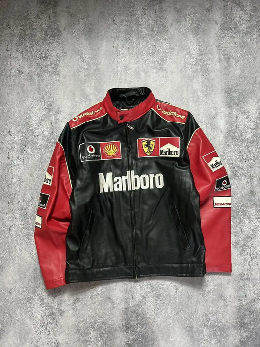 Black and red racing jacket with various sponsor logos on a gray background